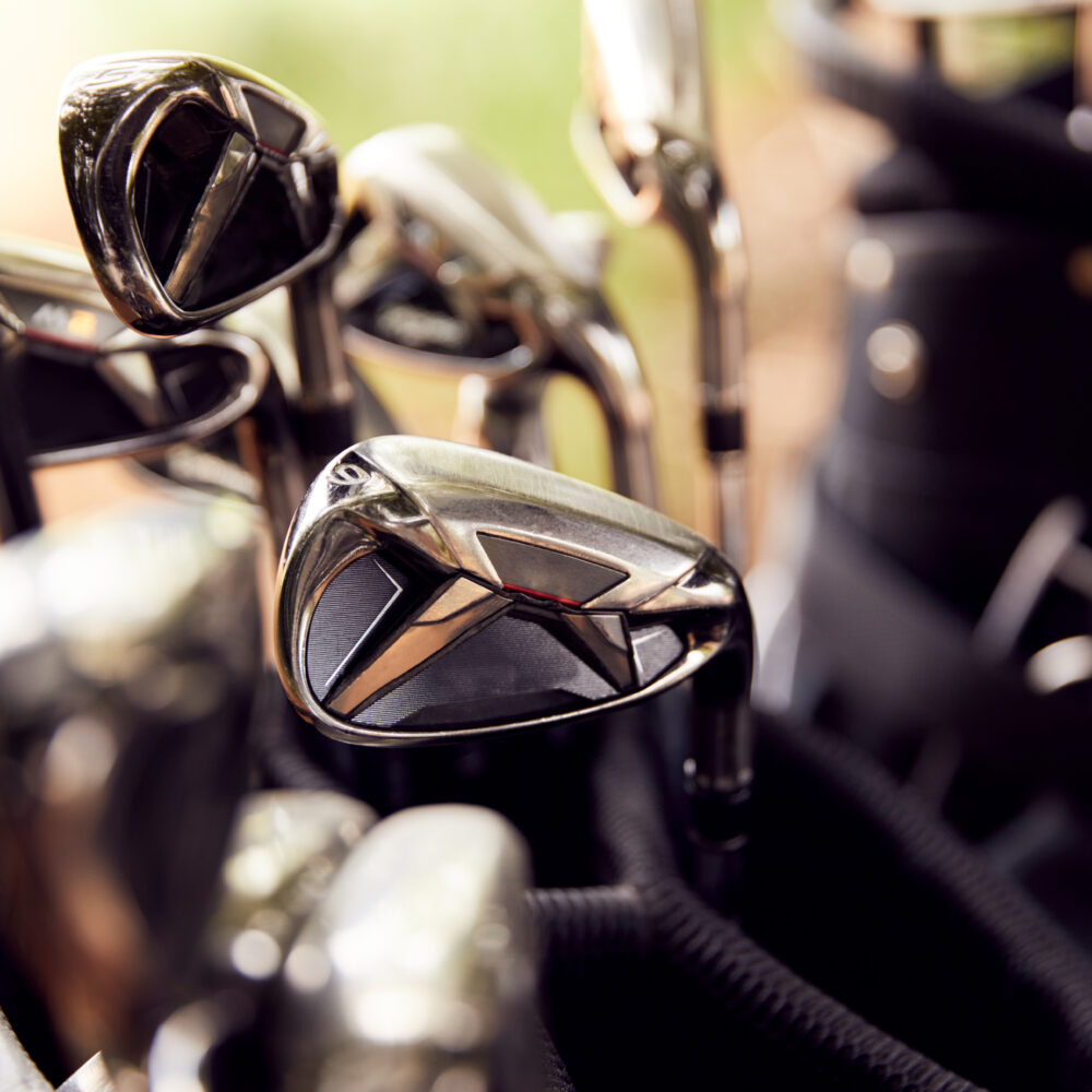 Close Up Of Clubs In Bag On Golf Buggy