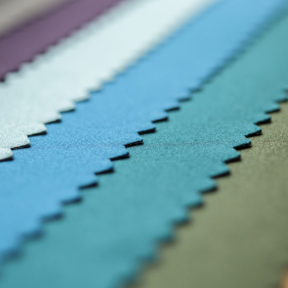 Different colored material samples in a row