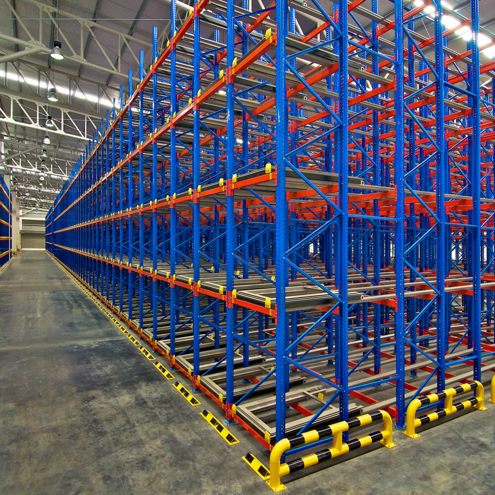 Complex, expansive racking system inside a warehouse facility.