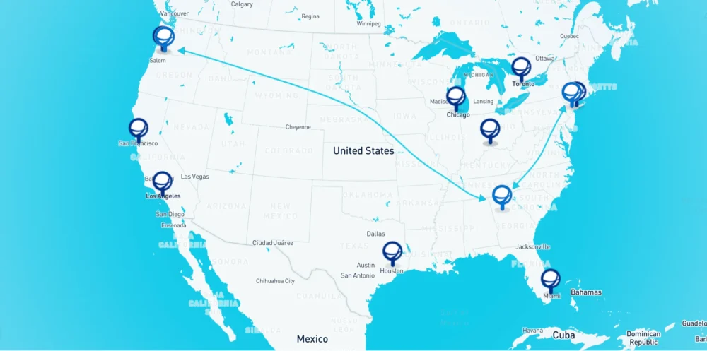 Map of the United States showing major logistics hubs and shipping routes marked with blue location icons and connecting arrows.